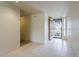 Tiled foyer with a view of the front door, showcasing the open layout at 14221 N 45Th St, Phoenix, AZ 85032