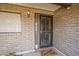 Close-up of the front door with a security screen and a welcoming doormat at 14221 N 45Th St, Phoenix, AZ 85032