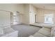 Open-concept living area with high ceilings, ample lighting, and neutral decor at 14221 N 45Th St, Phoenix, AZ 85032