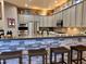 Kitchen includes a bar, stainless steel appliances, and extensive cabinet space at 14253 N Honeysuckle N Dr, Fountain Hills, AZ 85268