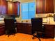 Office with built-in wood cabinets, desk, and window with blinds providing natural light at 14253 N Honeysuckle N Dr, Fountain Hills, AZ 85268
