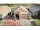 Aerial view of the home showcasing its desert landscaping, front yard, and proximity to the golf course at 1437 E Glenhaven Dr, Phoenix, AZ 85048