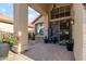 Inviting front entrance featuring a decorative security door, potted plants, and a welcoming ambiance at 1437 E Glenhaven Dr, Phoenix, AZ 85048