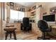 Organized home office with custom built-ins, ample storage, and dual workstations at 1437 E Glenhaven Dr, Phoenix, AZ 85048