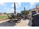 Outdoor patio with a dining table and chairs set, ideal for outdoor entertaining at 1437 E Glenhaven Dr, Phoenix, AZ 85048
