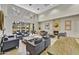Inviting community room with cozy seating, a fireplace, and plenty of natural light at 16 W Encanto Blvd # 22, Phoenix, AZ 85003