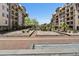 Beautiful courtyard view showcasing manicured landscaping and attractive building architecture at 16 W Encanto Blvd # 22, Phoenix, AZ 85003