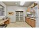 Bright kitchen with granite countertops, white appliances, and ample cabinet space at 16 W Encanto Blvd # 22, Phoenix, AZ 85003