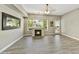 Inviting living room with fireplace, large windows, and bright natural light at 16 W Encanto Blvd # 22, Phoenix, AZ 85003