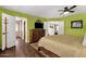 Spacious main bedroom features double door entrances to a walk-in closet and bathroom, creating a luxurious retreat at 1978 E Carver Rd, Tempe, AZ 85284