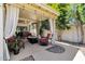Cozy covered patio with seating around a fire pit, offering an inviting outdoor living space at 1978 E Carver Rd, Tempe, AZ 85284