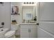 Well-lit bathroom showcasing modern fixtures, stylish mirror, and decorative wall art at 3033 N 367Th Ave, Tonopah, AZ 85354
