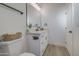 Modern bathroom featuring a white vanity with marble countertop and bronze fixtures at 3033 N 367Th Ave, Tonopah, AZ 85354