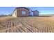Modern-design home featuring sleek lines, expansive grounds and minimalist landscaping at 3033 N 367Th Ave, Tonopah, AZ 85354