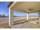 Covered patio featuring a ceiling fan and plenty of space for outdoor seating and entertaining at 3033 N 367Th Ave, Tonopah, AZ 85354