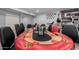 Close up on a poker table in a finished basement entertainment room at 3931 E Fox Cir, Mesa, AZ 85205