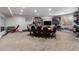 Entertainment basement space with treadmill, game table, and display shelves at 3931 E Fox Cir, Mesa, AZ 85205