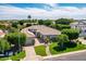 Beautiful home with mature landscaping, a brick walkway and a well-manicured lawn at 3931 E Fox Cir, Mesa, AZ 85205