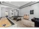 Well-lit game room with a shuffleboard, ping pong table, corn hole boards, and a dart board at 3931 E Fox Cir, Mesa, AZ 85205