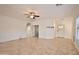 Bright, open living room features tile floors and direct access to the front entrance and other rooms at 4119 E Tether Trl, Phoenix, AZ 85050