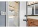 This bathroom is located inside the house and provides access to the backyard covered patio at 4631 N 77Th Dr, Phoenix, AZ 85033