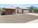 Attractive exterior view, highlighting the home's brick accents, tidy landscaping, and garage at 4631 N 77Th Dr, Phoenix, AZ 85033