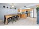 Open-concept kitchen and dining area featuring modern appliances and ample counter space at 4631 N 77Th Dr, Phoenix, AZ 85033