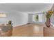 This bright living room features light wood floors and plenty of natural light at 5315 S River Dr, Tempe, AZ 85283