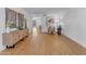 Open living area with light wood flooring and views of the outside at 5315 S River Dr, Tempe, AZ 85283