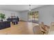 Open floor plan showing the living room and kitchen in neutral tones leading to the backyard patio at 5315 S River Dr, Tempe, AZ 85283