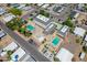 This aerial view showcases the community center with its lush landscaping and two sparkling swimming pools at 625 W Mckellips Rd # 80, Mesa, AZ 85201