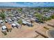 Beautiful manufactured home in a vibrant community, featuring desert landscaping and clear blue skies at 625 W Mckellips Rd # 80, Mesa, AZ 85201