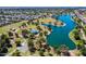 Expansive aerial shot highlighting the community's serene lake, parks, and amenities at 8107 E Vista Dr, Scottsdale, AZ 85250