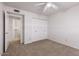 Bedroom with a closet and adjacent doorway to a bathroom at 8107 E Vista Dr, Scottsdale, AZ 85250