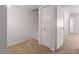 This bedroom has neutral carpet, white walls, and a closet at 8107 E Vista Dr, Scottsdale, AZ 85250