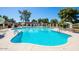 Spacious community pool with multiple access ladders and ample seating areas for relaxation at 8107 E Vista Dr, Scottsdale, AZ 85250