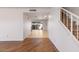 Open-concept space with tiled flooring, staircase, and sliding glass door at 8107 E Vista Dr, Scottsdale, AZ 85250