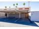 Assigned covered parking area with a storage unit at 8107 E Vista Dr, Scottsdale, AZ 85250