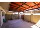 Covered patio area with a concrete foundation and surrounding privacy wall at 8107 E Vista Dr, Scottsdale, AZ 85250