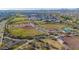 Community aerial view of a public baseball field and park and recreation area for neighborhood at 10741 E Palladium Dr, Mesa, AZ 85212