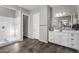 Bright bathroom with tile floors features a walk-in shower and double sink vanity at 10741 E Palladium Dr, Mesa, AZ 85212
