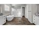 Bright bathroom features tile flooring, a soaking tub, and walk in shower at 10741 E Palladium Dr, Mesa, AZ 85212