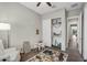 Neutral bedroom with a closet, offers a table and carpeted flooring at 10741 E Palladium Dr, Mesa, AZ 85212
