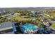 Experience the community's inviting pool, sunbathing area, and lush landscaping, offering a perfect blend of relaxation and recreation at 10741 E Palladium Dr, Mesa, AZ 85212