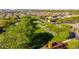 A greenbelt meanders through the neighborhood at 10741 E Palladium Dr, Mesa, AZ 85212