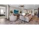 Cozy living room with tile floors, modern furniture, and a large screen television at 10741 E Palladium Dr, Mesa, AZ 85212