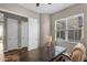 Bright office features a large window and wood floors, offering a practical workspace at 10741 E Palladium Dr, Mesa, AZ 85212