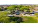 Aerial view of the community park featuring mature trees, walking paths, and green space for outdoor enjoyment at 10741 E Palladium Dr, Mesa, AZ 85212