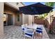 Outdoor patio with a dining set and covered patio at 10741 E Palladium Dr, Mesa, AZ 85212