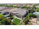 Beautiful aerial view of home highlighting its patio area, manicured lawn, and outdoor living space at 10741 E Palladium Dr, Mesa, AZ 85212
